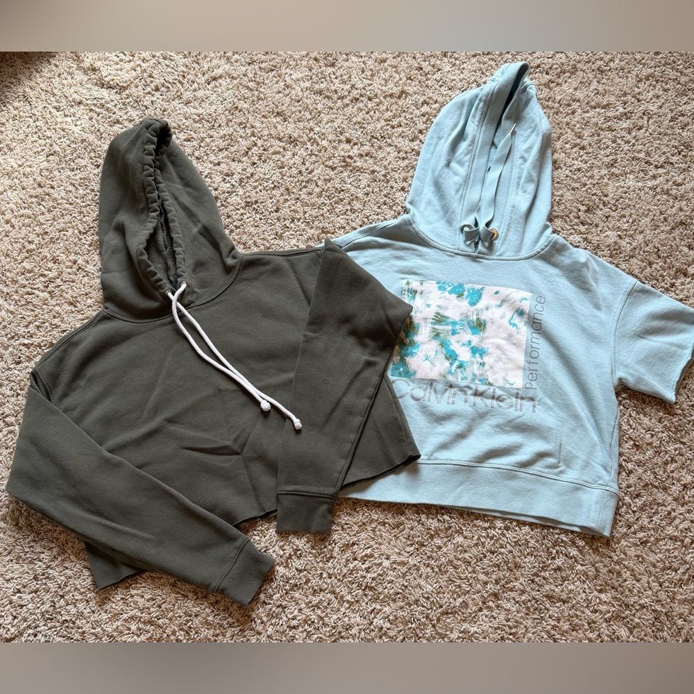 Two women's size small athletic sweaters. I'm selling both for one price.